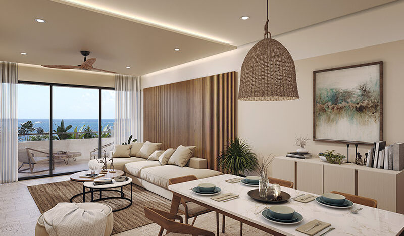 Sala de estar amplia y lujosa en el Condominio Nalu Luxury Beachfront Residences con mobiliario de alta calidad y decoración moderna.